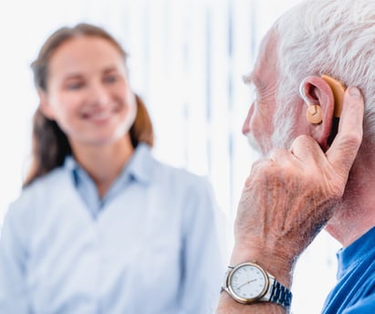 focused-picture-of-an-elderly-male-patient-with-hearing-aid-side-view-picture-id1279371001